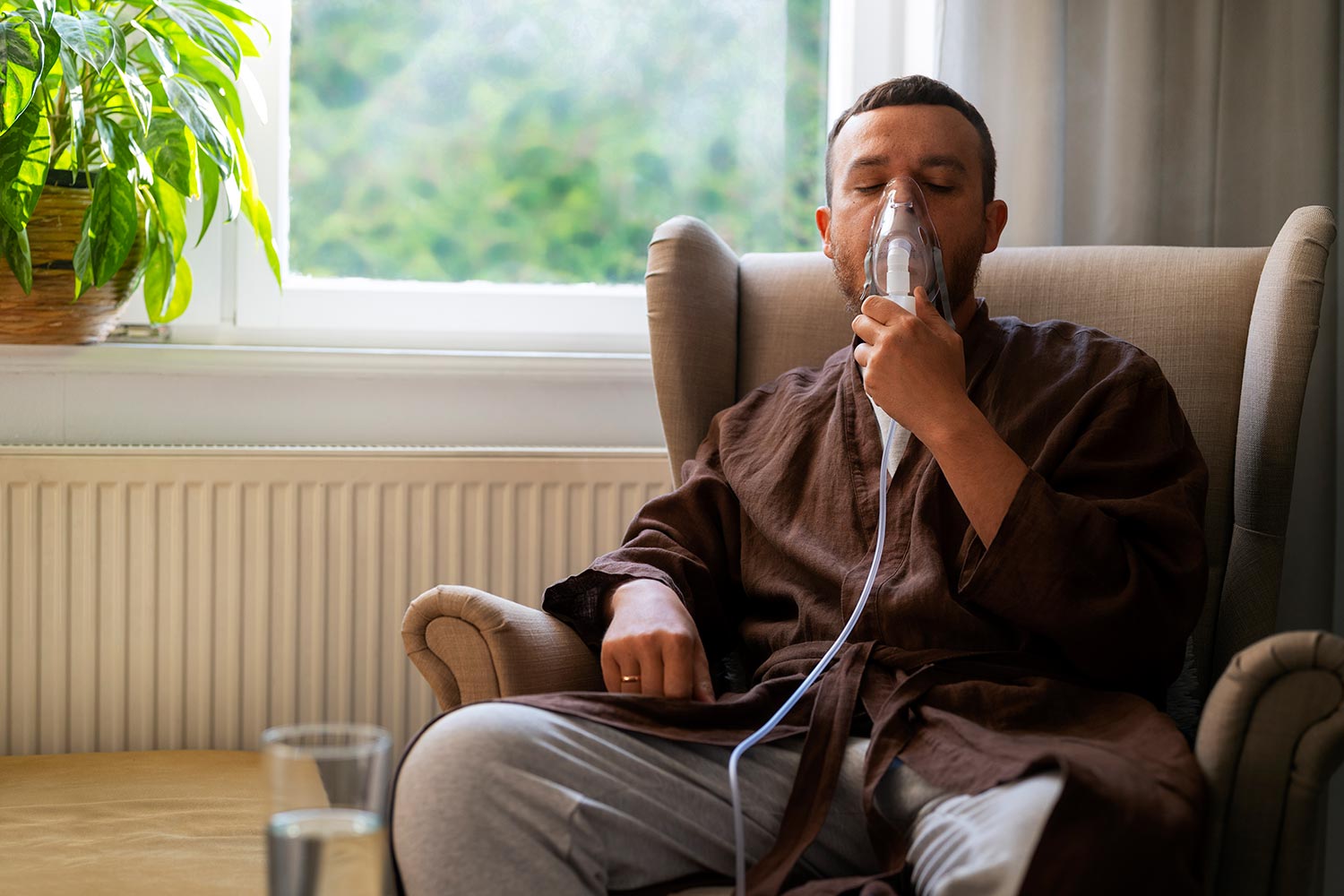 front-view-man-using-nebulizer_tmp1183522801